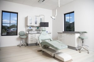 Inside treatment room with dental chair